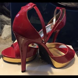 NIB red stilettos